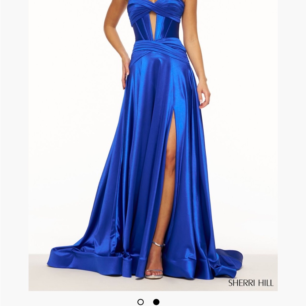 Strapless corset A-Line gown with a keyhole and high slit.Style # 56396